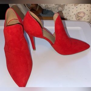 Christian Siriano red heels